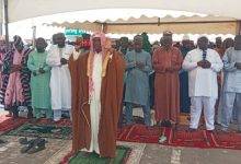 Imam leading the Muslims in Eid prayers