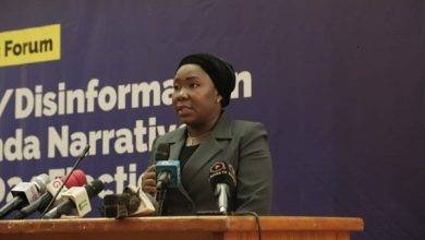 Fatimatu Abubakar (inset) addressing participants at the forum
