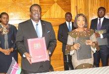 • Ms Shirley Ayorkor Botchwey (right) and Dr Musalia Mudavadi showing copies of the agreement document Photo: Ebo Gorman