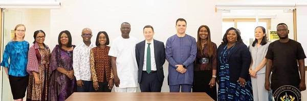 Dr Mohammed Anim Adam and Stéphane Roudet (middle) with other officials after the meeting
