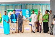 • Mr Lee (fifth from left) handing over the equipment to Dr Aboagye (sixth from right). Looking on are Mr Dewez and others