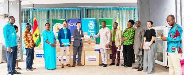 • Mr Lee (fifth from left) handing over the equipment to Dr Aboagye (sixth from right). Looking on are Mr Dewez and others