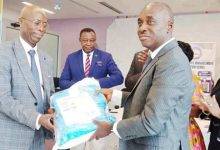• Mr Andoh (right) presenting a caesarian section pack to Dr Srofenyoh