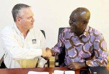 • Mr Amponsah-Mensah (right) interacting with Mr Gary Sheppard