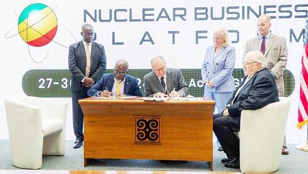 • Prof. Dampare (second from left) signing the MoU for Ghana, and technical staff, US Department of State (fourth right), signing for the US