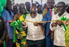 President Akufo-Addo (middle) being assisted by Asantehene, Otumfuo Osei Tutu II, to cut the tape to open the airportPresident Akufo-Addo (middle) being assisted by Asantehene, Otumfuo Osei Tutu II, to cut the tape to open the airport