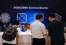 Foxconn shareholders look at wafers on display after the annual shareholder meeting in New Taipei City, Taiwan May 31, 2023. REUTERS/Ann Wang/File Photo Purchase Licensing Rights