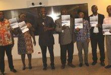 • Prof. Kwasi Torpey (third from left), Prof. Mawuli Dzodzomenyo (third from right) and other dignataries launching the document Photo: Ebo Gorman