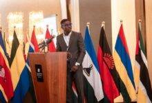 • Mr Sammy Darko (inset) addressing delegates at the conference
